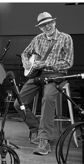 Chris Brown playing a banjo