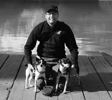 Blake posing with his dogs
